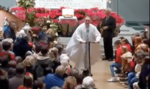 Hilarious Dublin priest leaves Christmas Eve mass on electric scooter
