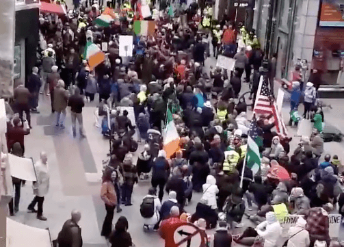 WATCH: Anti-mask protesters block up Grafton Street while chanting at shoppers